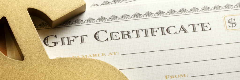 A dollar sign resting against empty pages saying "Gift Certificate".