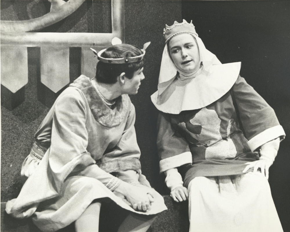 A young king takes advice from an older woman in this production of King John from the 1960's.