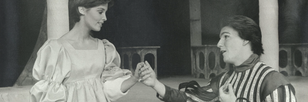Wearing Elizabethan costumes, a young man woos a young woman in the 1978 production of Twelfth Night.